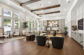 Living room with a high ceiling and wooden floors at Arcadia Cartersville Apartments, Cartersville, GA, 30121